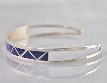 Description Sterling Silver Bracelet set with Manmade Lapis Stones 